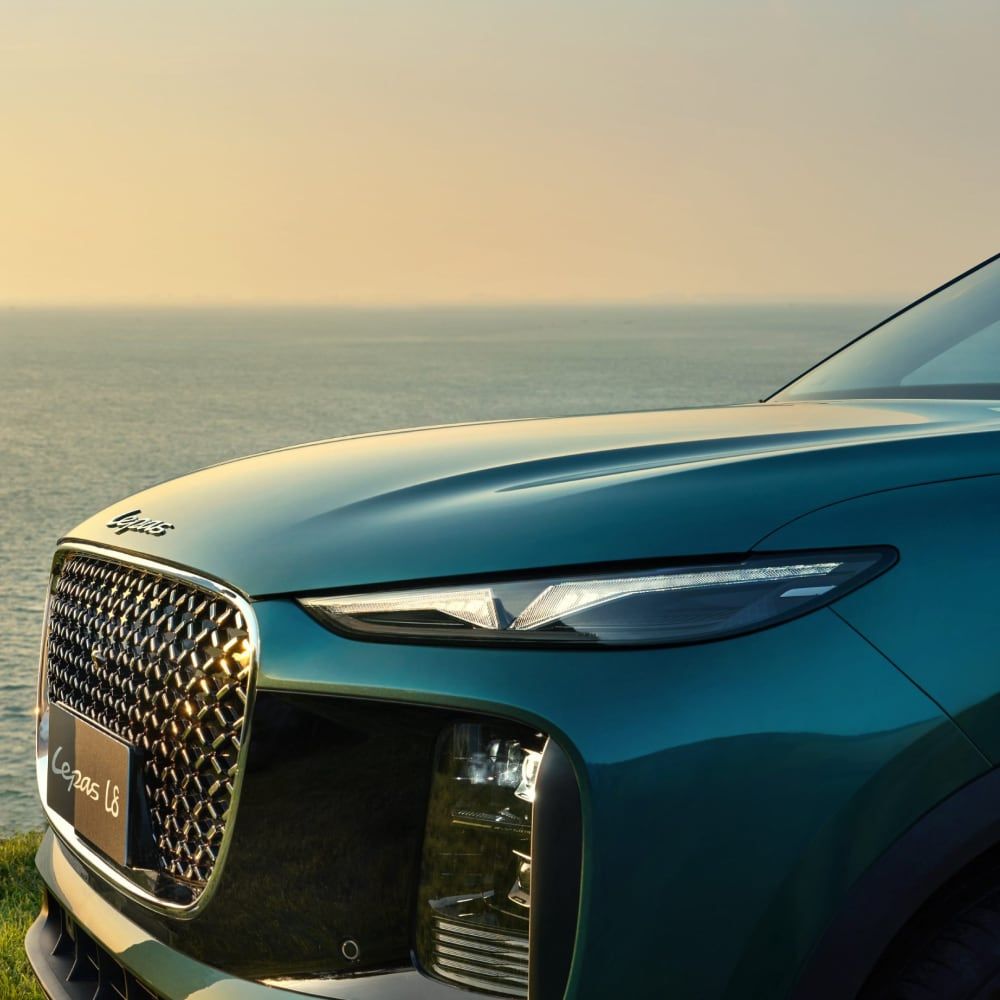 Close front view of the LEPAS L8 grille and headlight design